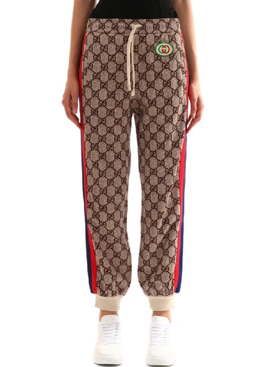 Shop Gucci Gg Supreme Print Sweatpants In Beige