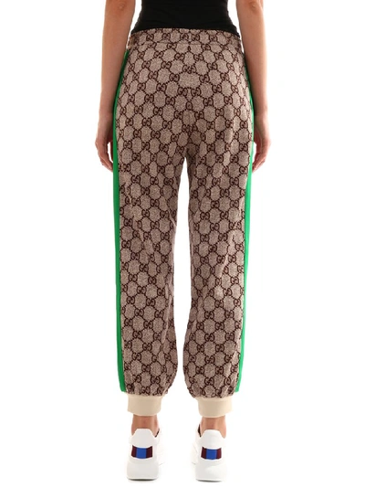 Shop Gucci Gg Supreme Print Sweatpants In Beige