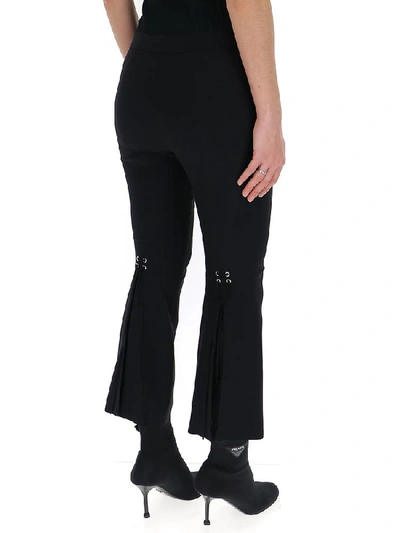 Shop Alexander Mcqueen Cropped Flared Trousers In Black