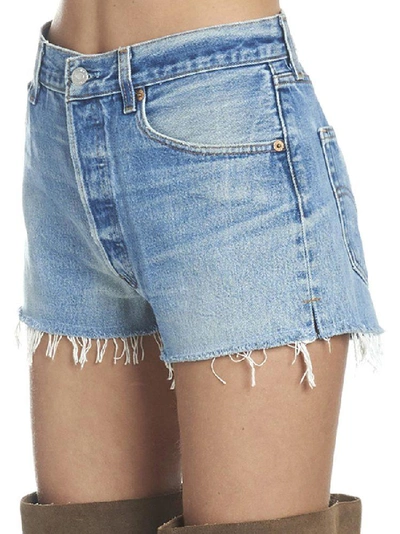 Shop Re/done Distressed Mini Shorts In Blue