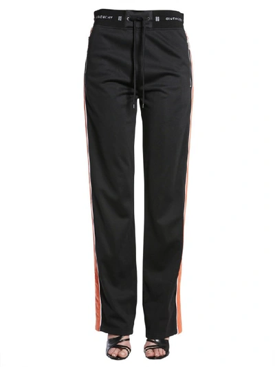 Shop Givenchy Striped Detail Jogging Pants In Black