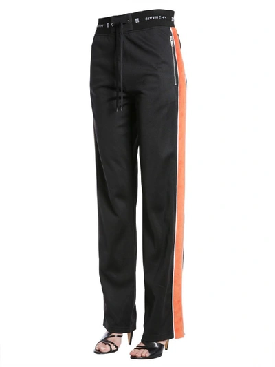 Shop Givenchy Striped Detail Jogging Pants In Black
