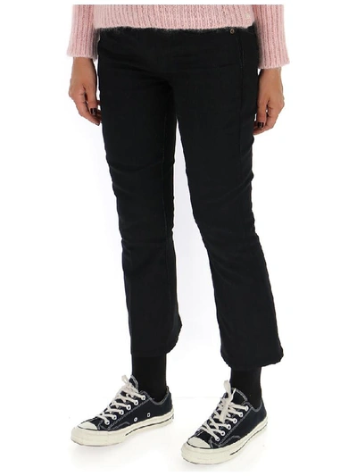 Shop Saint Laurent Cropped Jeans In Black