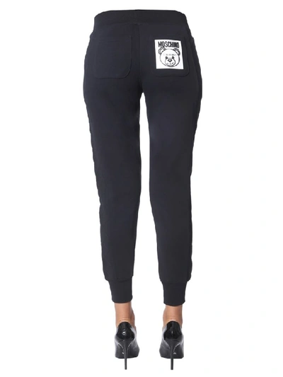 Shop Moschino Teddy Bear Patch Track Trousers In Black