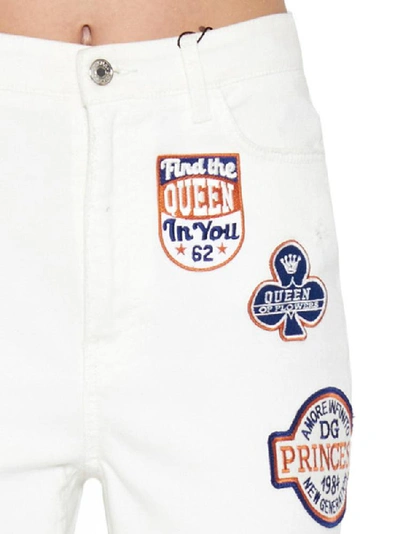 Shop Dolce & Gabbana Patches Flared Jeans In White