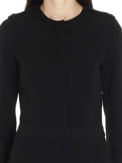 Shop Stella Mccartney Flared Long Sleeved Jumpsuit In Black