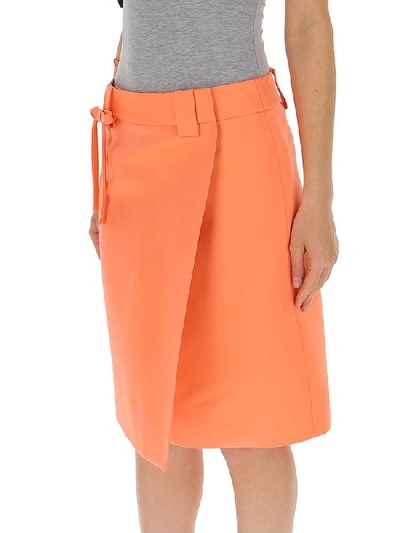 Shop Prada Bow Detail Wrap Skirt In Orange