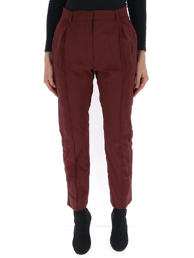 Shop Valentino Cropped Pleated Trousers In Red