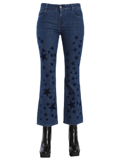 Shop Stella Mccartney Star Print Flared Jeans In Blue