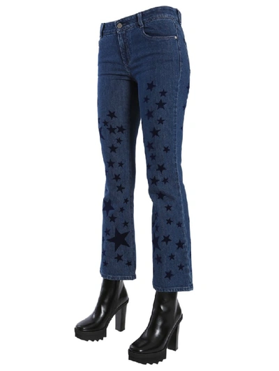 Shop Stella Mccartney Star Print Flared Jeans In Blue