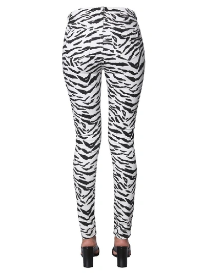 Shop Saint Laurent Animalier Print Skinny Jeans In White