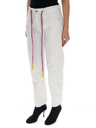 Shop Palm Angels Drawstring Jeans In White