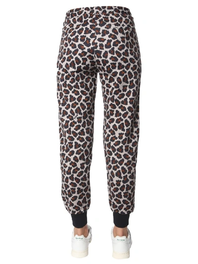 Shop Msgm Leopard Print High Rise Track Pants In Multi