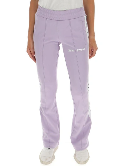 Shop Palm Angels Logo Printed Flared Pants In Purple
