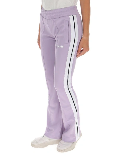 Shop Palm Angels Logo Printed Flared Pants In Purple
