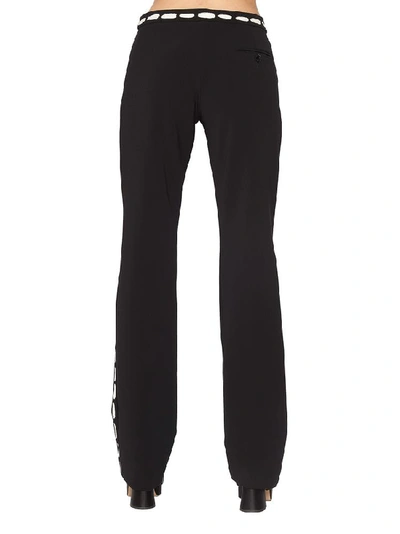 Shop Moschino Striped Detail Pants In Black