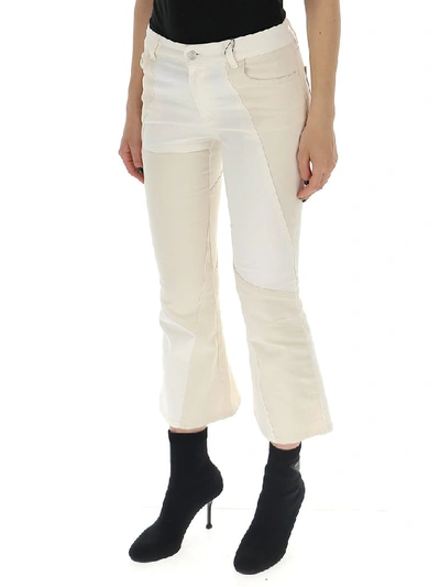 Shop Alexander Mcqueen Cropped Flared Jeans In White