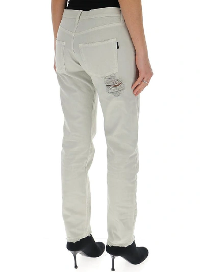Shop Saint Laurent Ripped Boyfriend Jeans In White