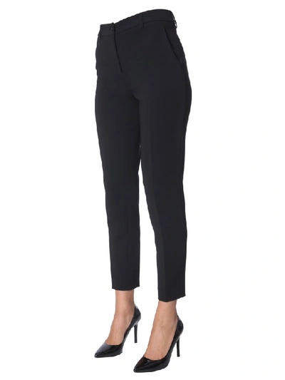 Shop Moschino High Waist Slim Fit Pants In Black