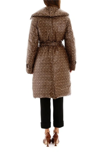 Shop Burberry Monogram Print Padded Trench Coat In Brown