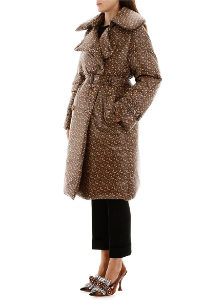 Shop Burberry Monogram Print Padded Trench Coat In Brown