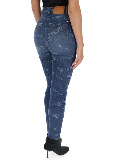 Shop Versace Logo Printed Skinny Jeans In Blue