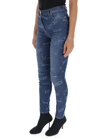 Shop Versace Logo Printed Skinny Jeans In Blue