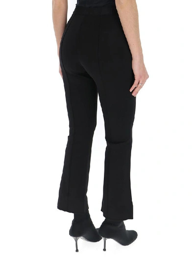 Shop Givenchy Flared Pants In Black