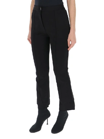 Shop Givenchy Flared Pants In Black