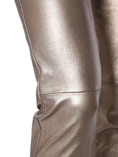 Shop Saint Laurent Skinny Fit Metallic Pants In Gold