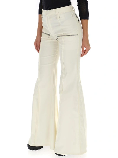 Shop Chloé Flared Front Zip Pants In White