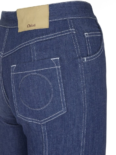 Shop Chloé Front Split Flare Jeans In Blue