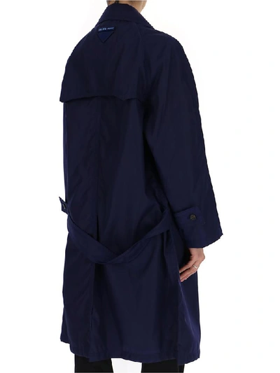 Shop Prada Double Breasted Trench Coat In Blue