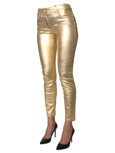 Shop Moschino Metallic Mid Rise Slim Fit Trousers In Gold