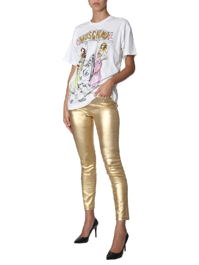 Shop Moschino Metallic Mid Rise Slim Fit Trousers In Gold