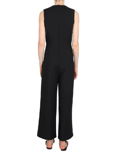 Shop Tory Burch Button Embellished Jumpsuit In Black