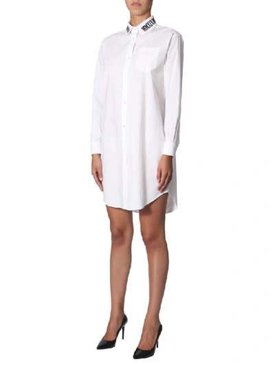Shop Moschino Logo Embroidered Shirt Dress In White