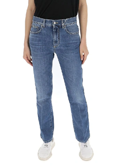 Shop Givenchy Bootcut Faded Jeans In Blue