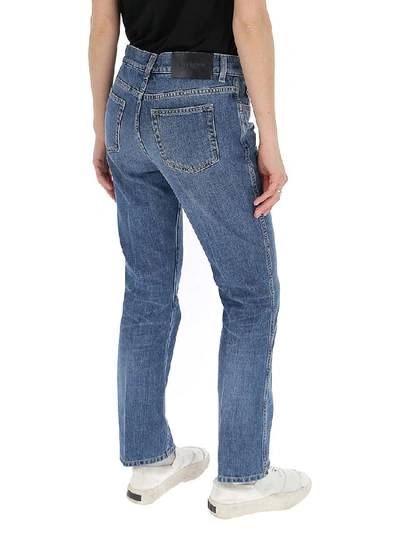 Shop Givenchy Bootcut Faded Jeans In Blue