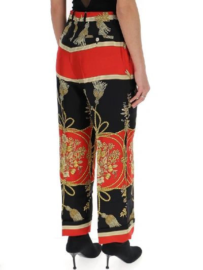 Shop Gucci Cropped Printed Pants In Multi