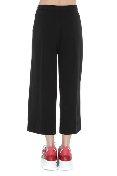 Shop Versace Medusa Buttons Cropped Trousers In Black