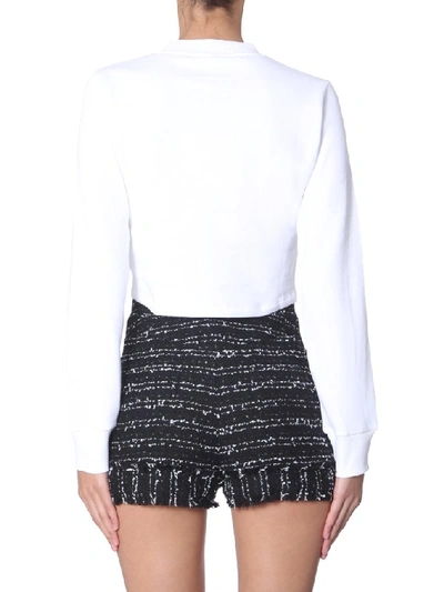 Shop Balmain Cropped Logo Sweater In White