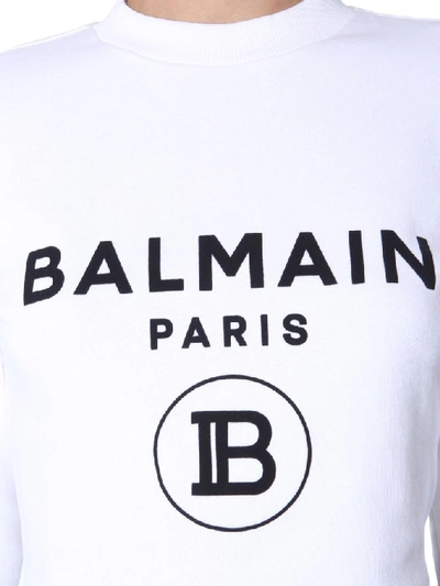 Shop Balmain Cropped Logo Sweater In White