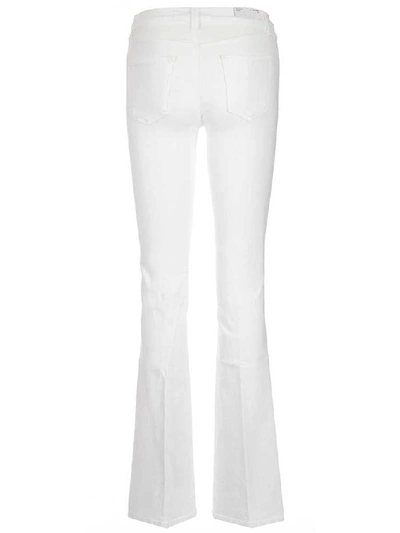 Shop J Brand High Rise Belted Flare Jeans In White