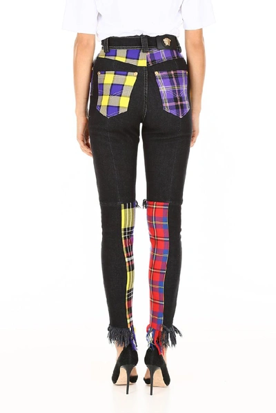 Shop Versace High Waist Patchwork Jeans In Black