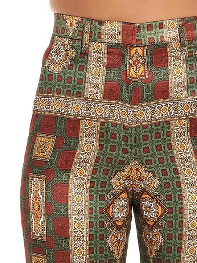 Shop Etro Flared Printed Trousers In Multi