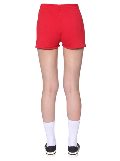 Shop Moschino Logo Mini Shorts In Red