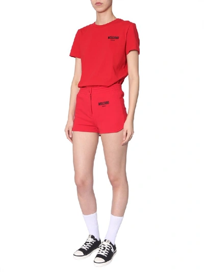 Shop Moschino Logo Mini Shorts In Red