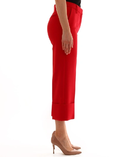 Shop Valentino High Waist Pleated Cropped Trousers In Red