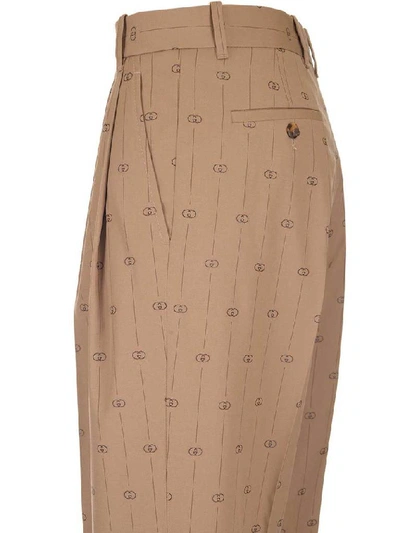 Shop Gucci Gg Striped Trousers In Beige